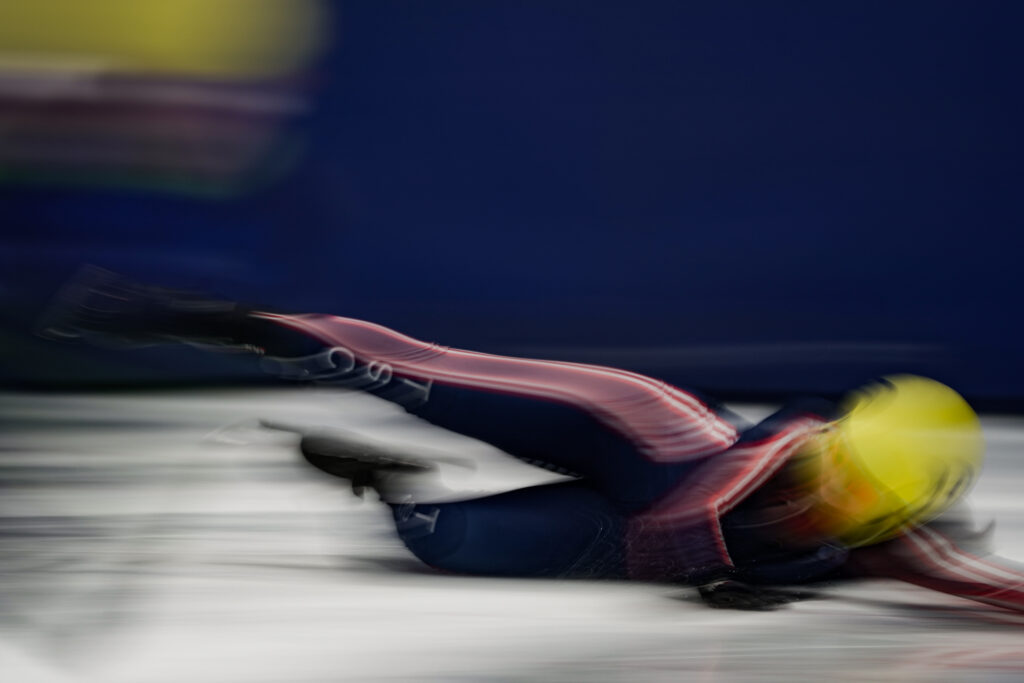 An athlete competing in athletic event sports with helmet