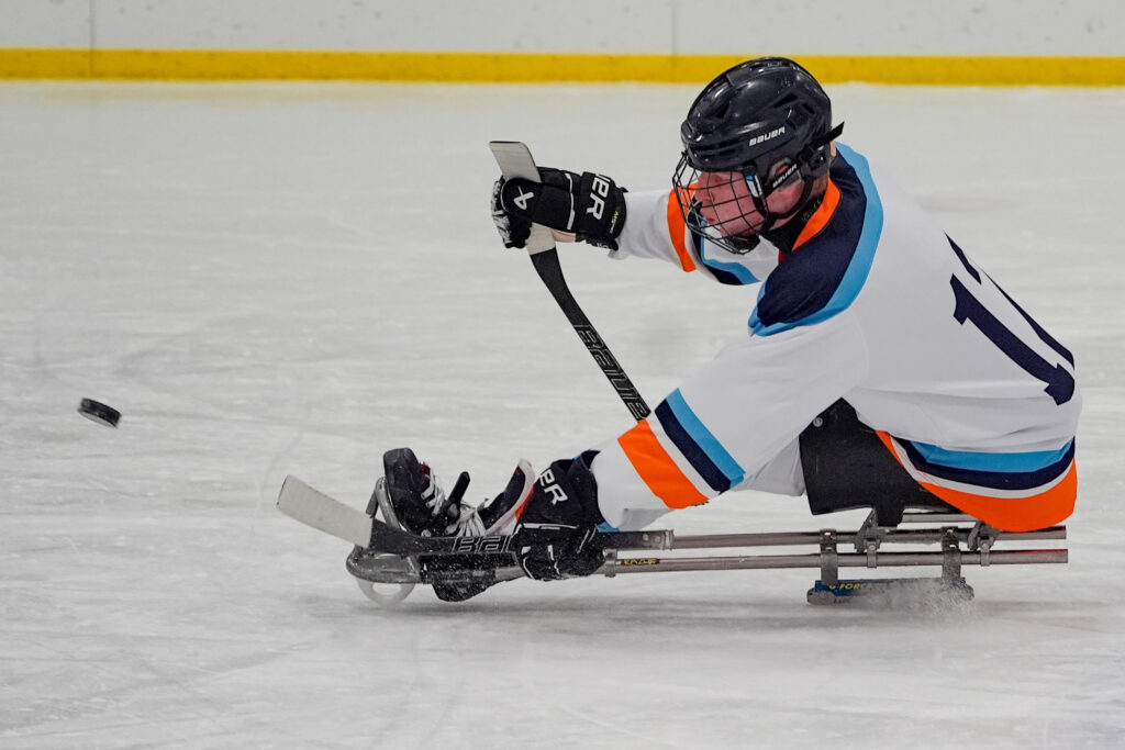 An athlete competing in athletic event sports with helmet