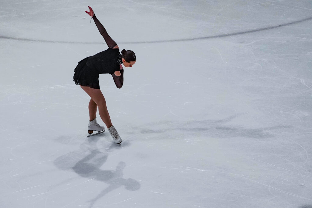 An athlete skating on the rink