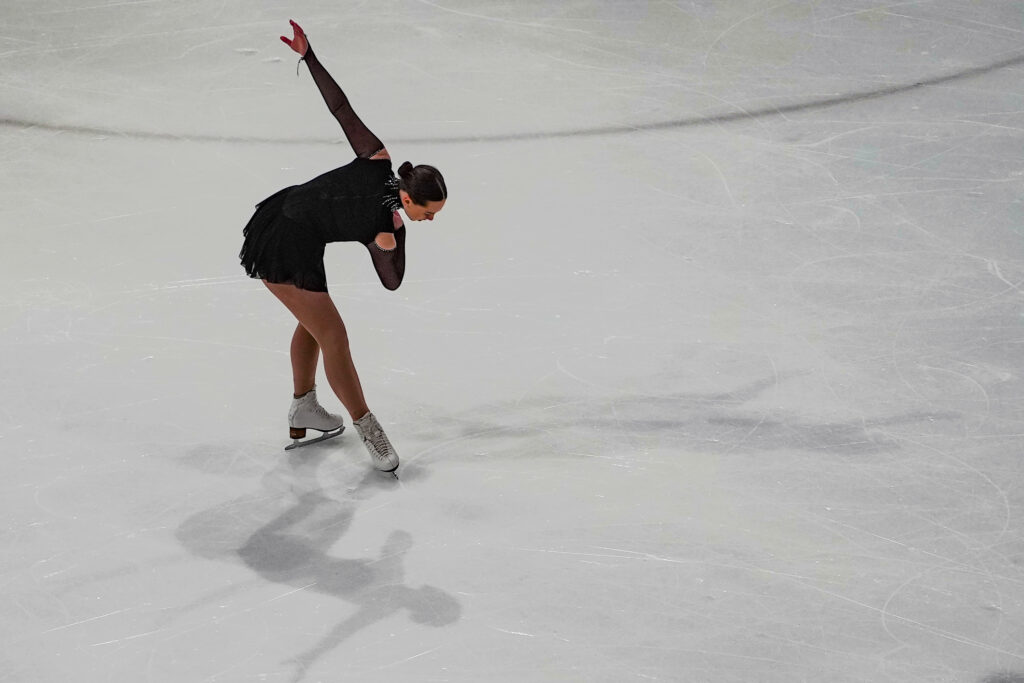 An athlete skating on the rink