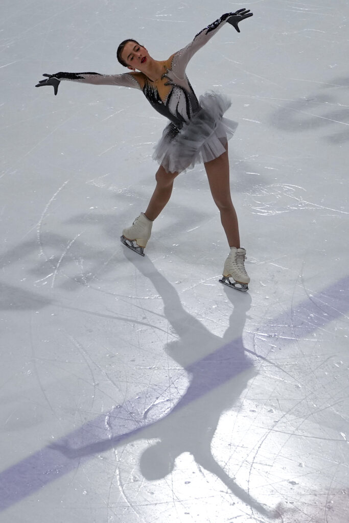 An athlete skating on the rink