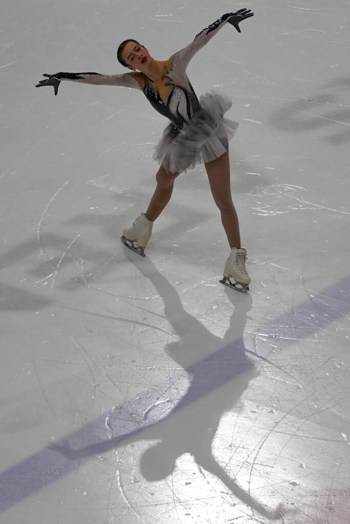 An athlete skating on the rink