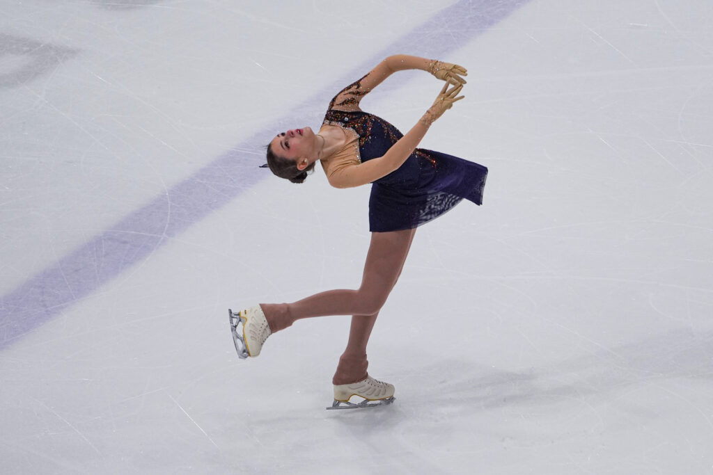 An athlete skating on the rink