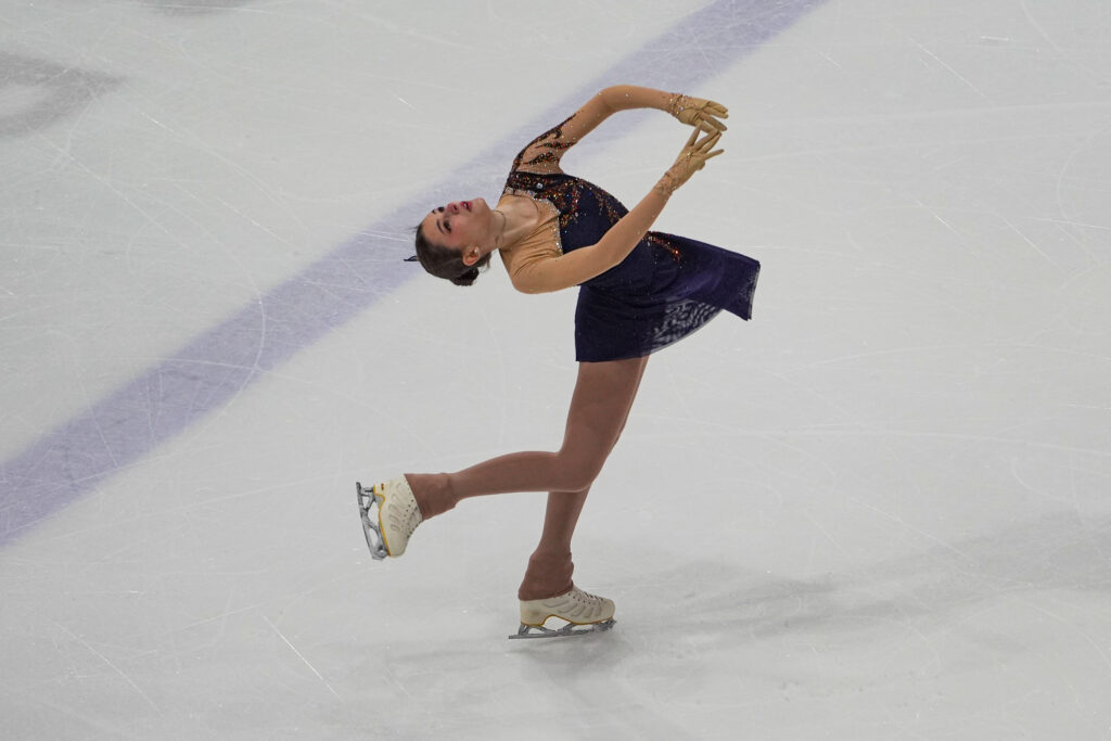 An athlete skating on the rink