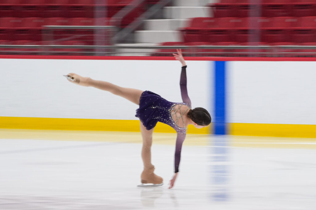 An athlete skating on the rink