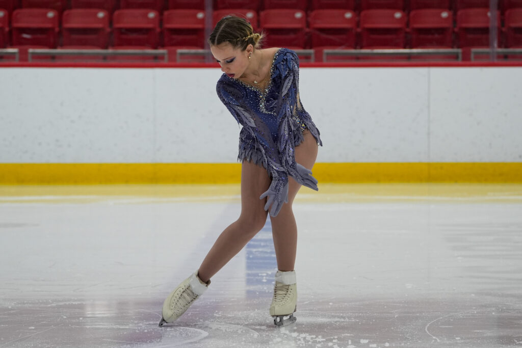 An athlete skating on the rink