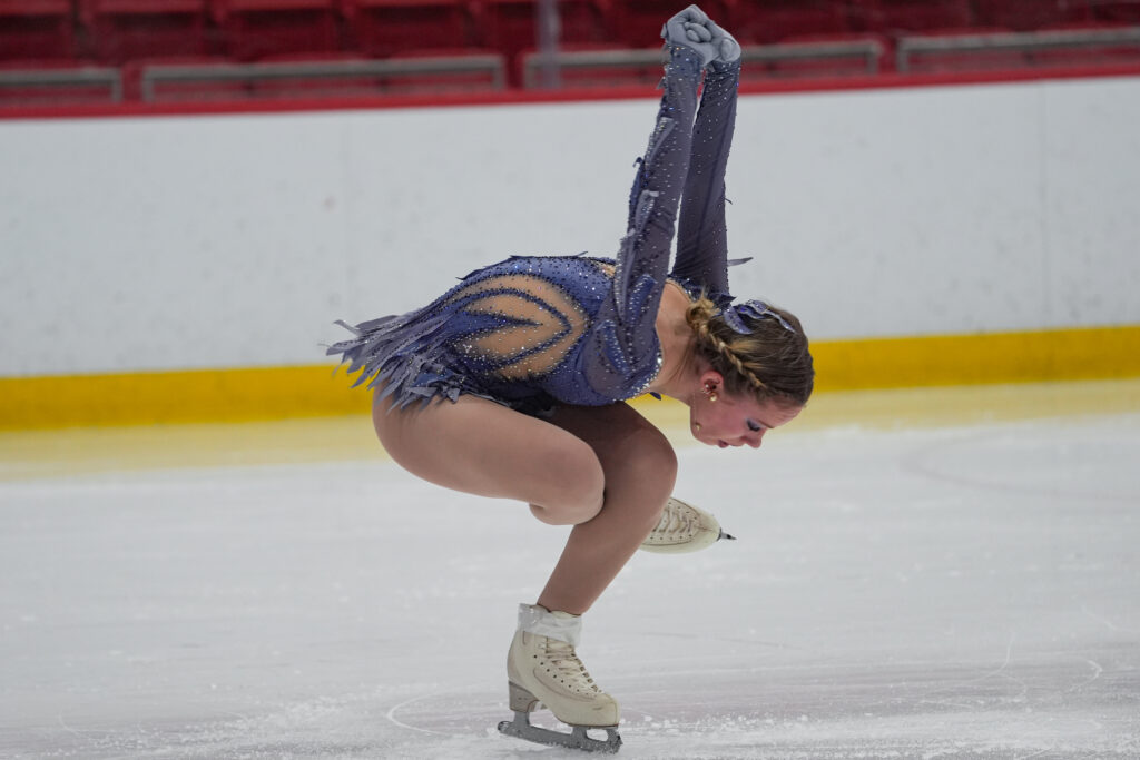 An athlete skating on the rink