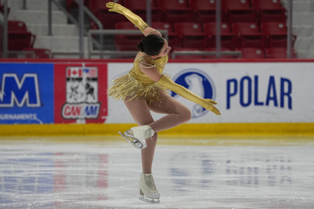 An athlete skating on the rink