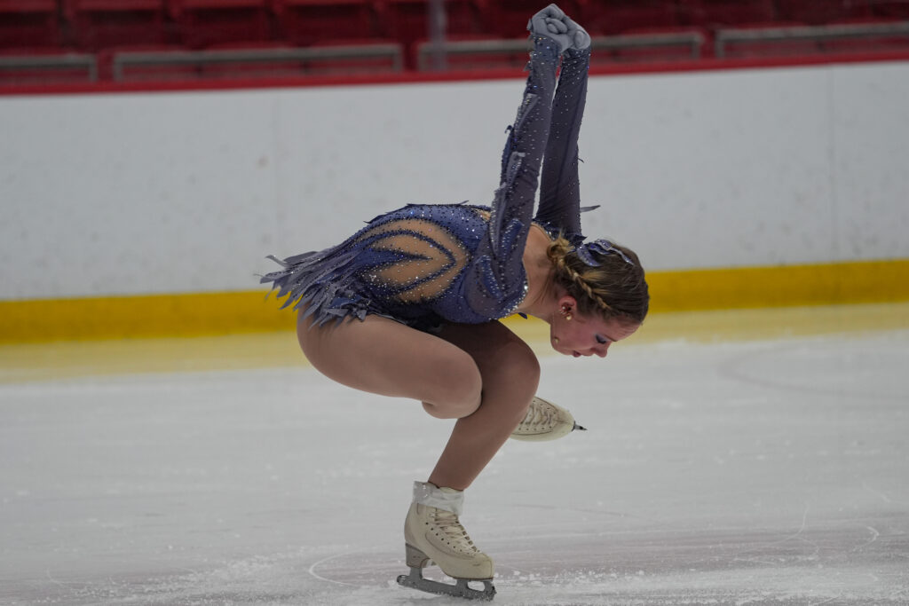 An athlete skating on the rink