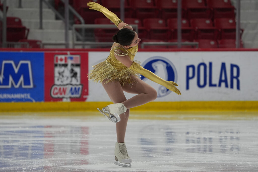 An athlete skating on the rink