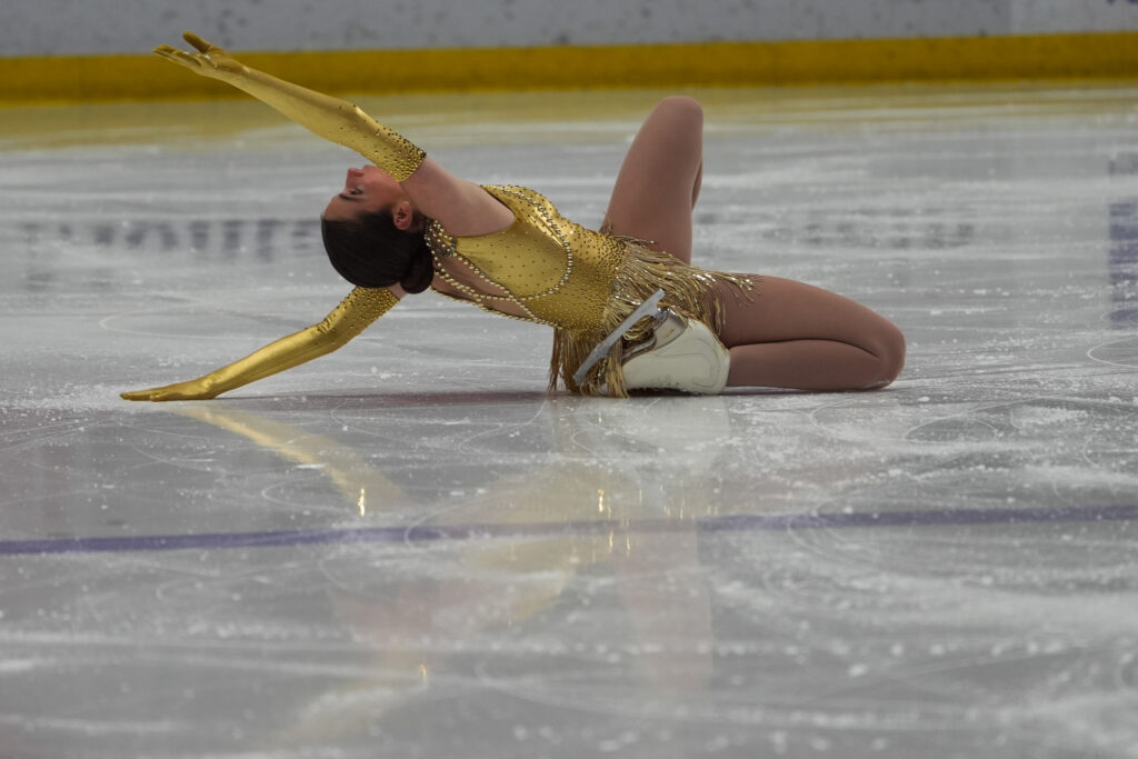 An athlete competing in athletic event sports