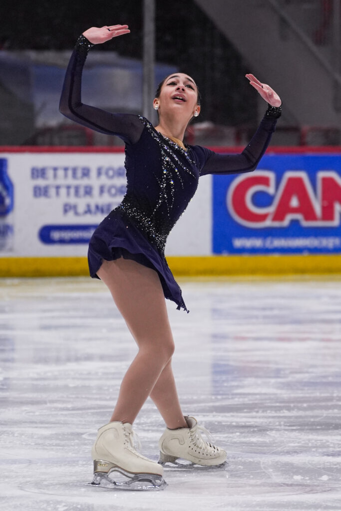 An athlete skating on the rink
