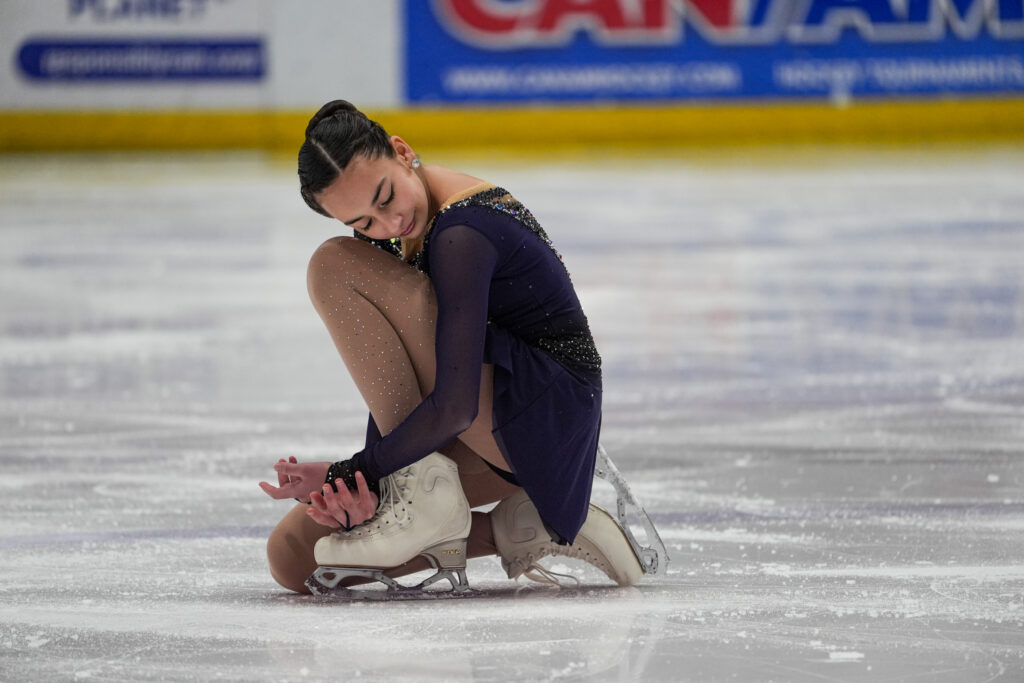 An athlete skating on the rink