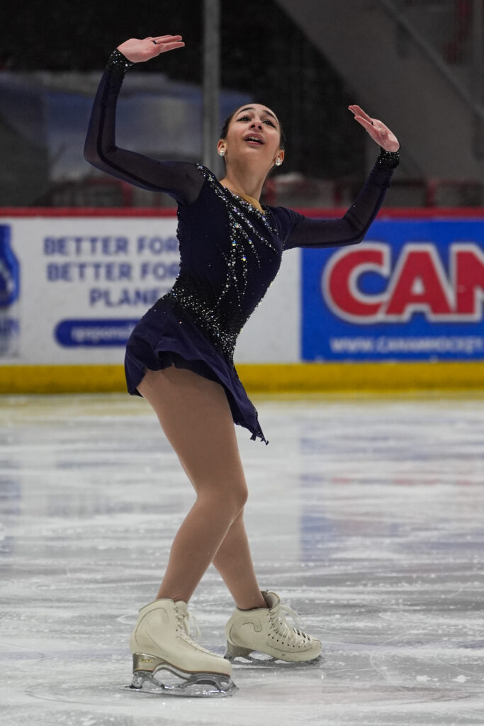 An athlete skating on the rink