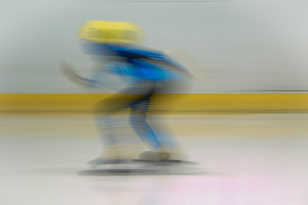 An athlete competing in athletic event sports with helmet