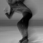 An athlete competing in athletic event sports with helmet