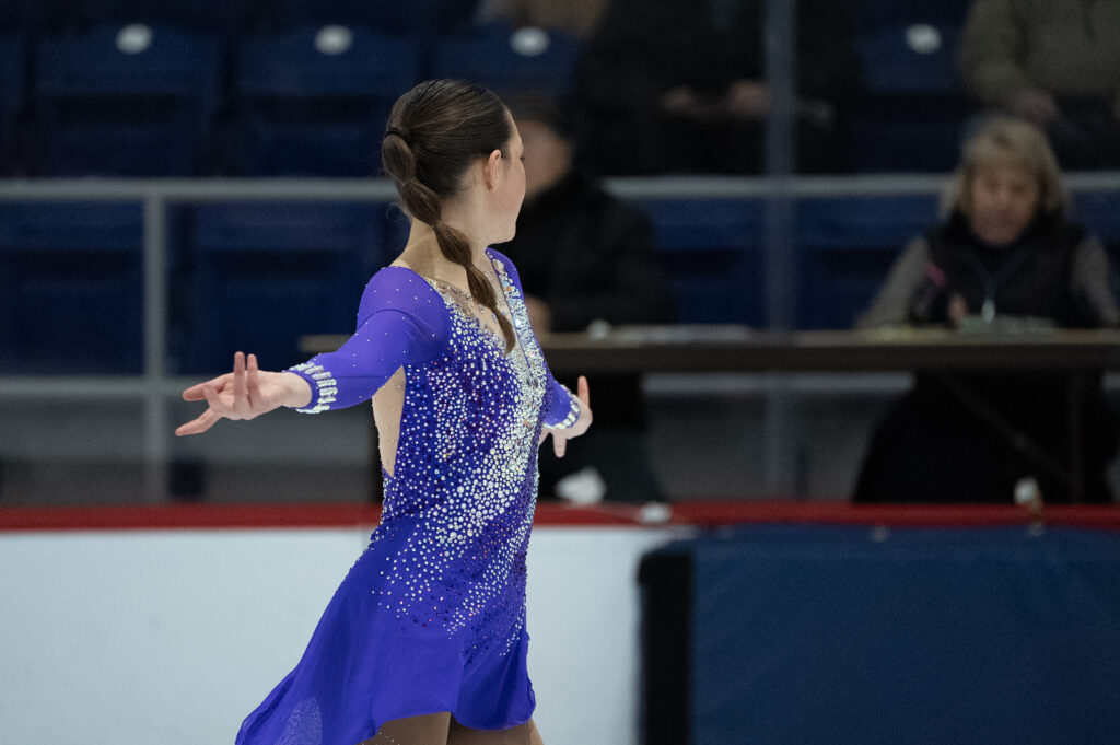 A group of athletes competing gymnastics