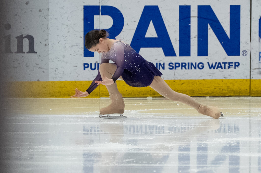 An athlete skating on the rink