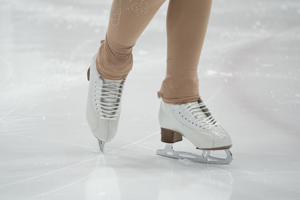 An athlete skating on the rink