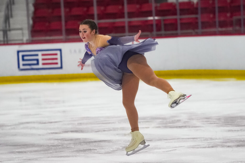 An athlete skating on the rink