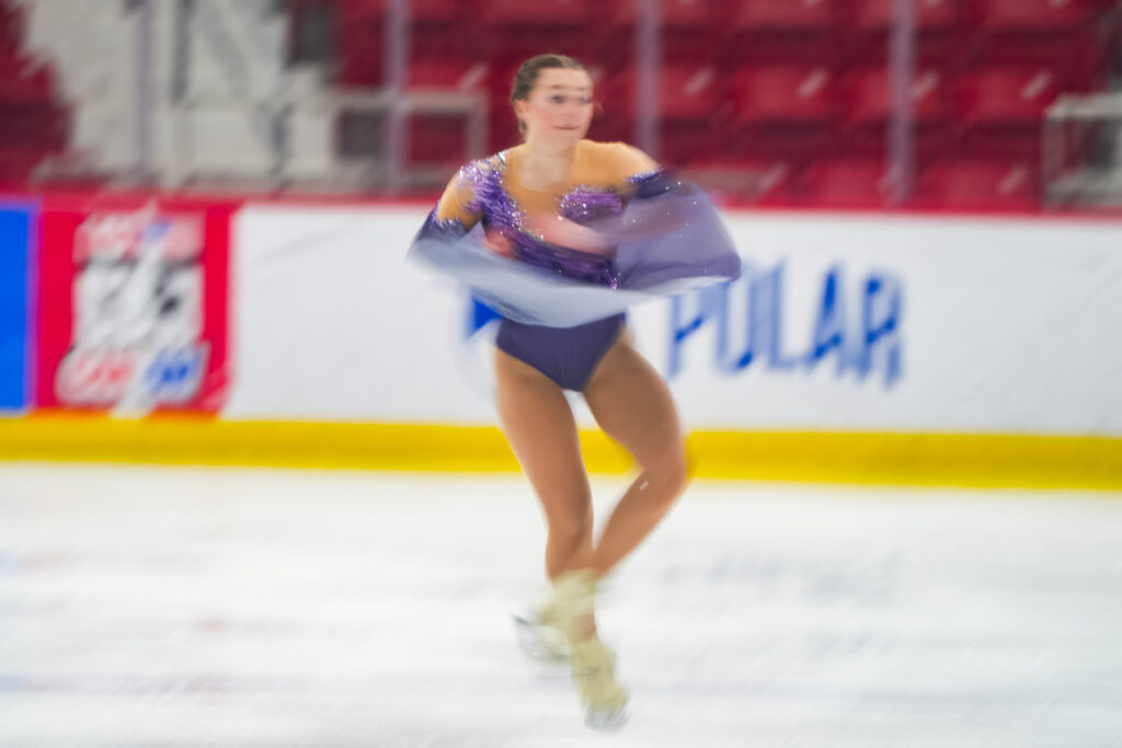 An athlete skating on the rink