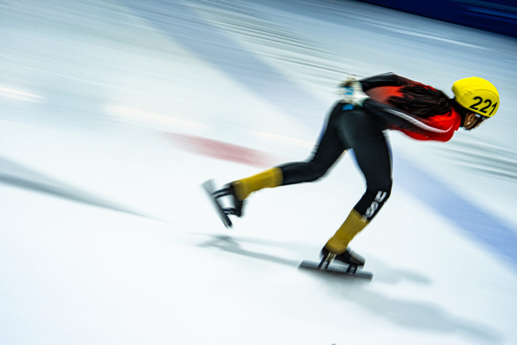 An athlete competing in athletic event sports with helmet