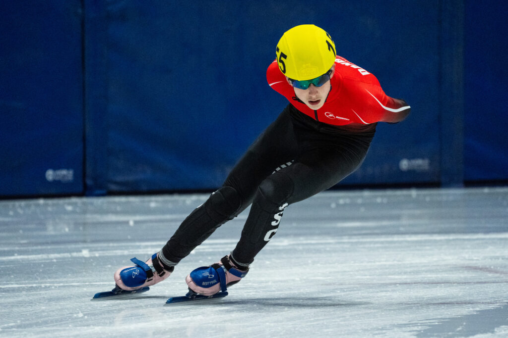 An athlete competing in athletic event sports with helmet