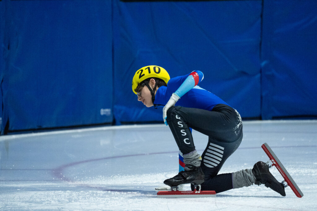 An athlete competing in athletic event sports with helmet