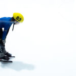 An athlete competing in athletic event sports with helmet