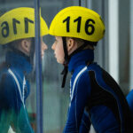 A group of athletes competing in athletic event sports with helmet