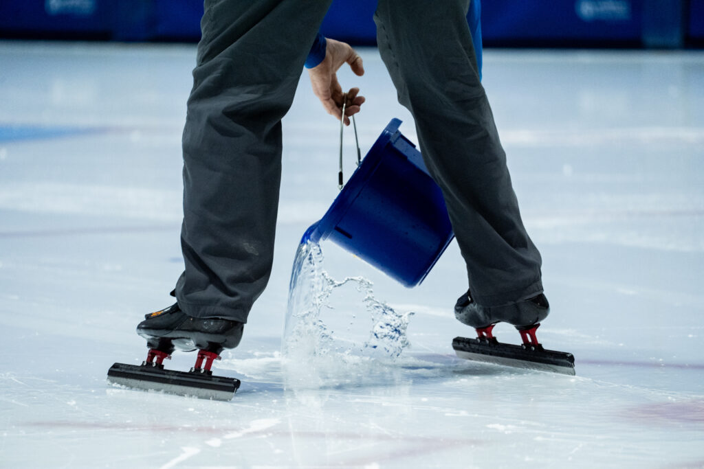 An athlete competing in athletic event sports