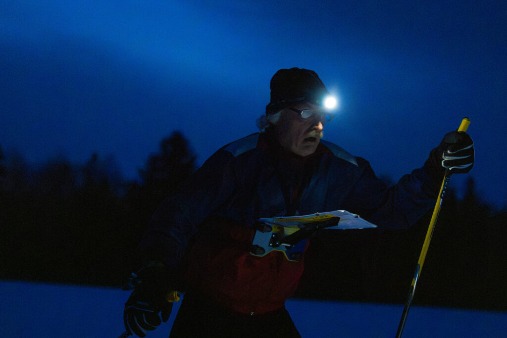 An athlete competing in athletic event sports outdoors