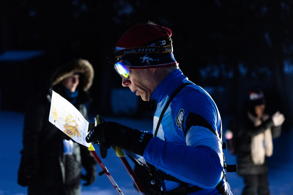 A group of athletes competing in athletic event sports