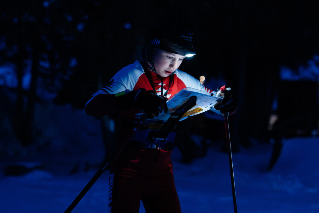 An athlete competing in athletic event sports