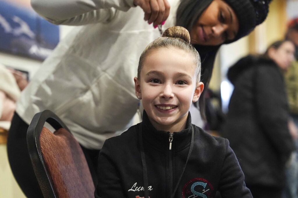 A group of athletes competing in athletic event sports