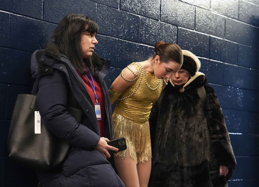 A group of athletes competing in athletic event sports