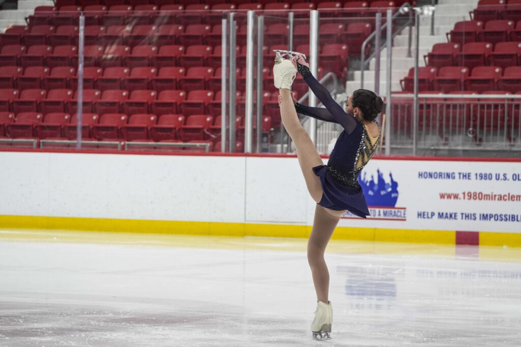 An athlete skating on the rink