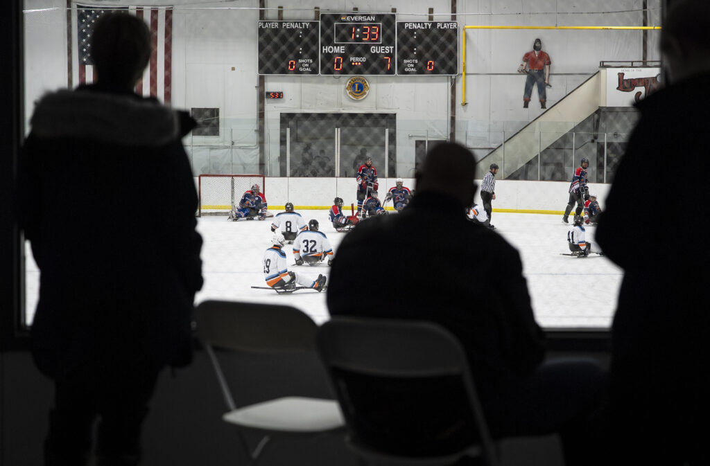 A group of athletes competing in athletic event sports with helmet
