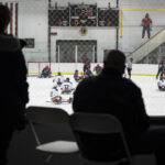 A group of athletes competing in athletic event sports with helmet