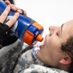 An athlete competing in athletic event sports