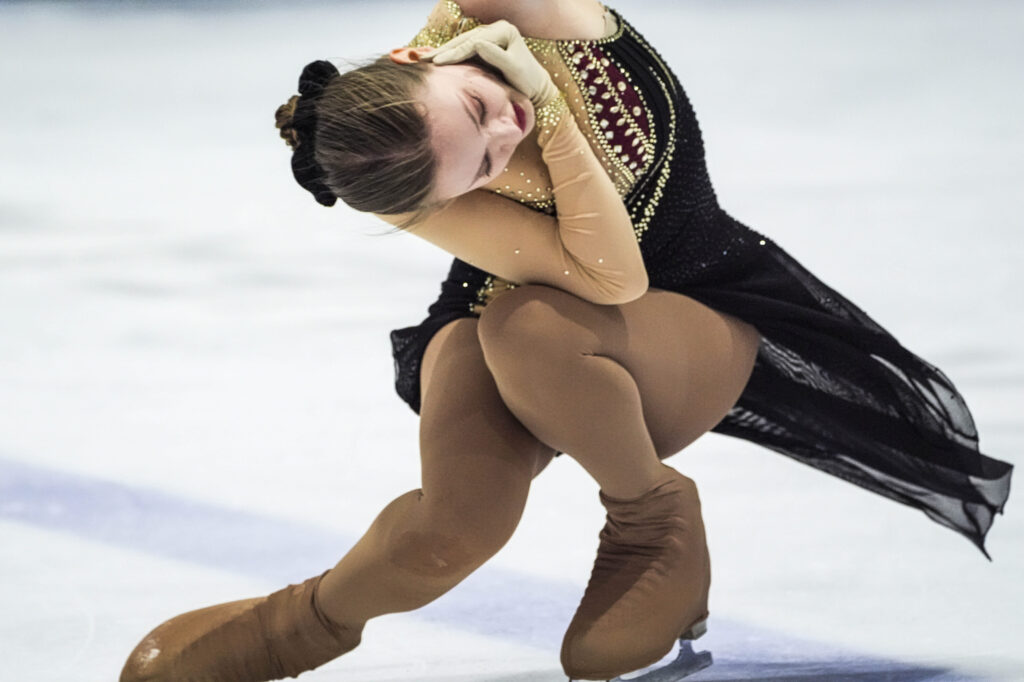 An athlete skating on the rink