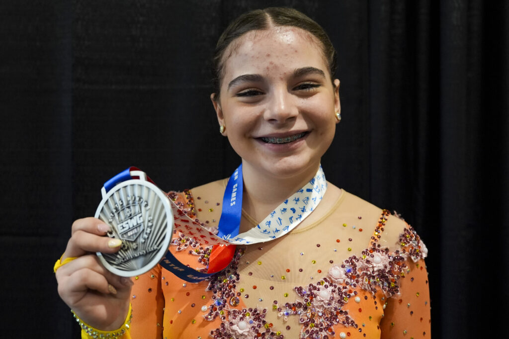 An athlete competing in athletic event sports