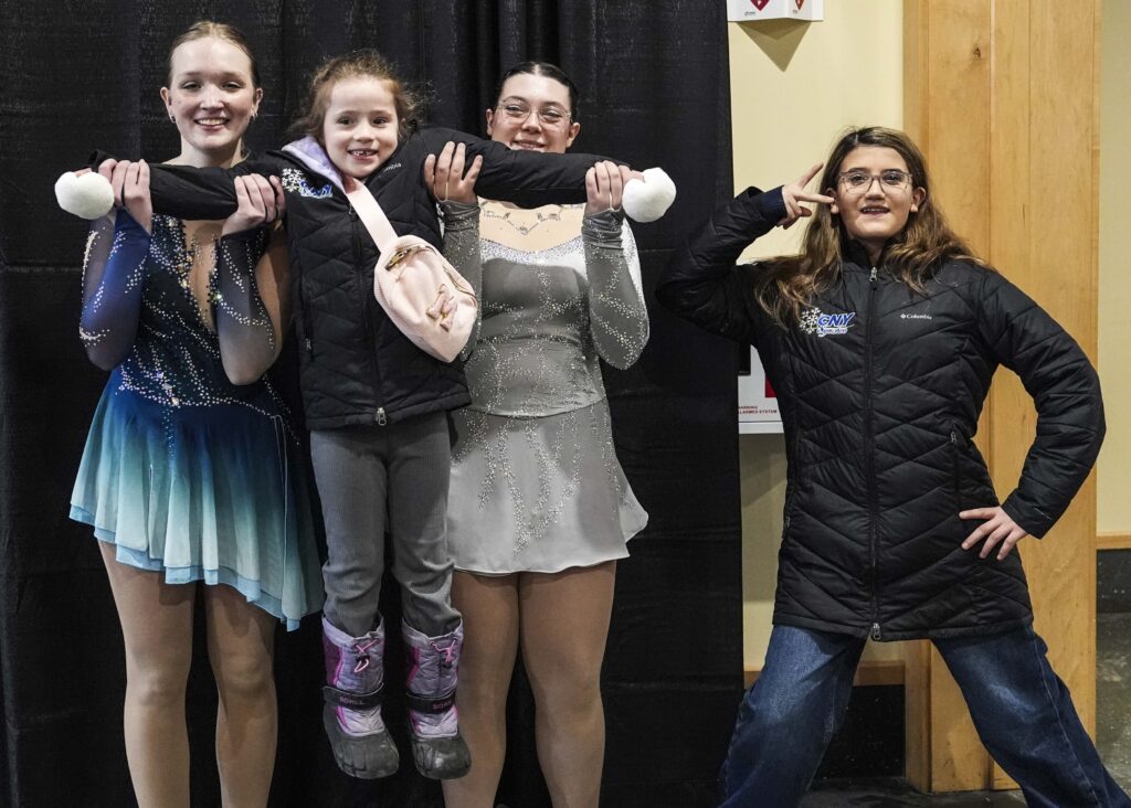 A group of athletes competing in athletic event sports