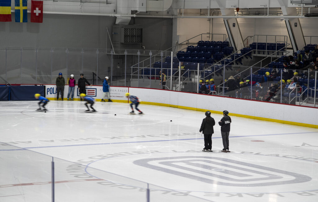 A group of athletes competing in athletic event sports with helmet