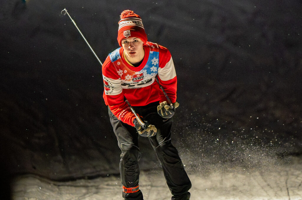 An athlete competing in athletic event sports in the snow
