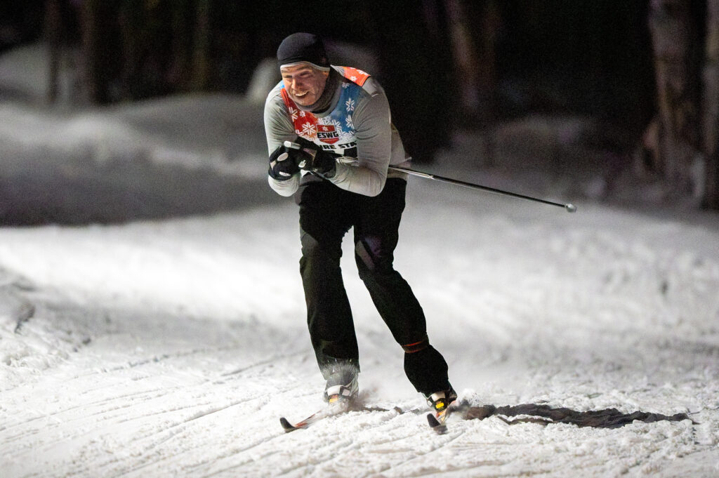 An athlete skiing in the snow