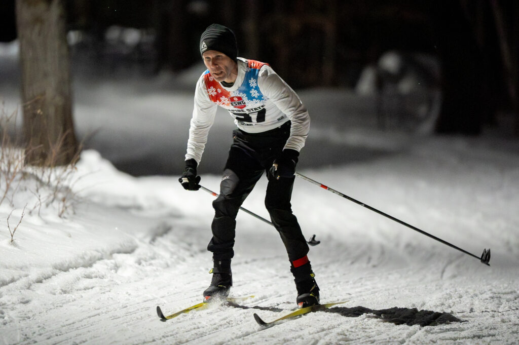 An athlete skiing in the snow