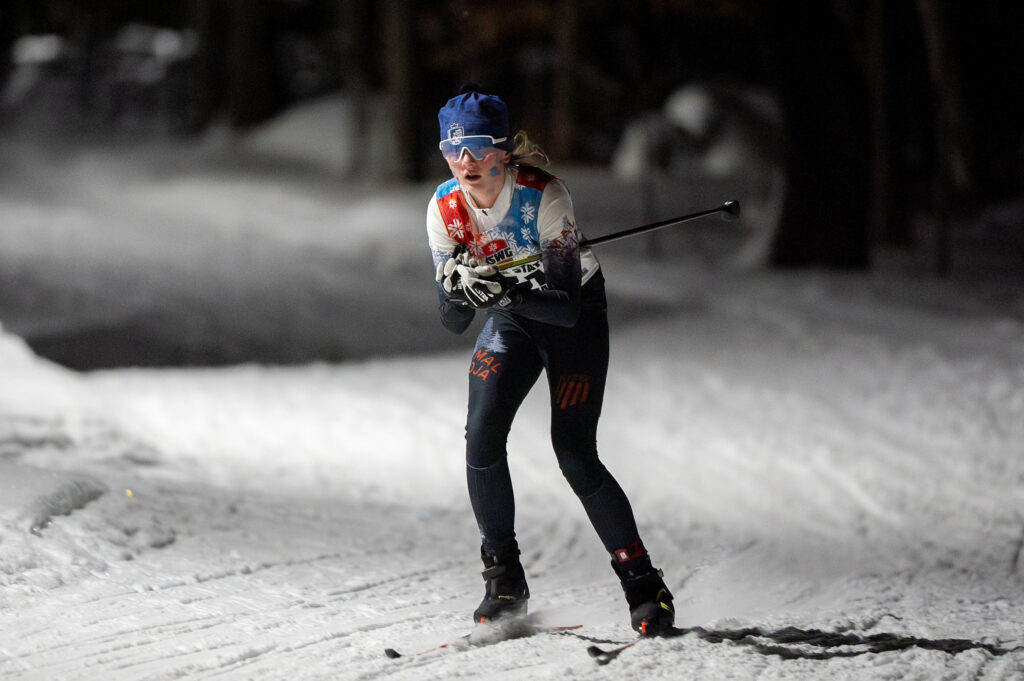 An athlete skiing in the snow