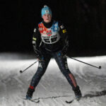 An athlete skiing in the snow