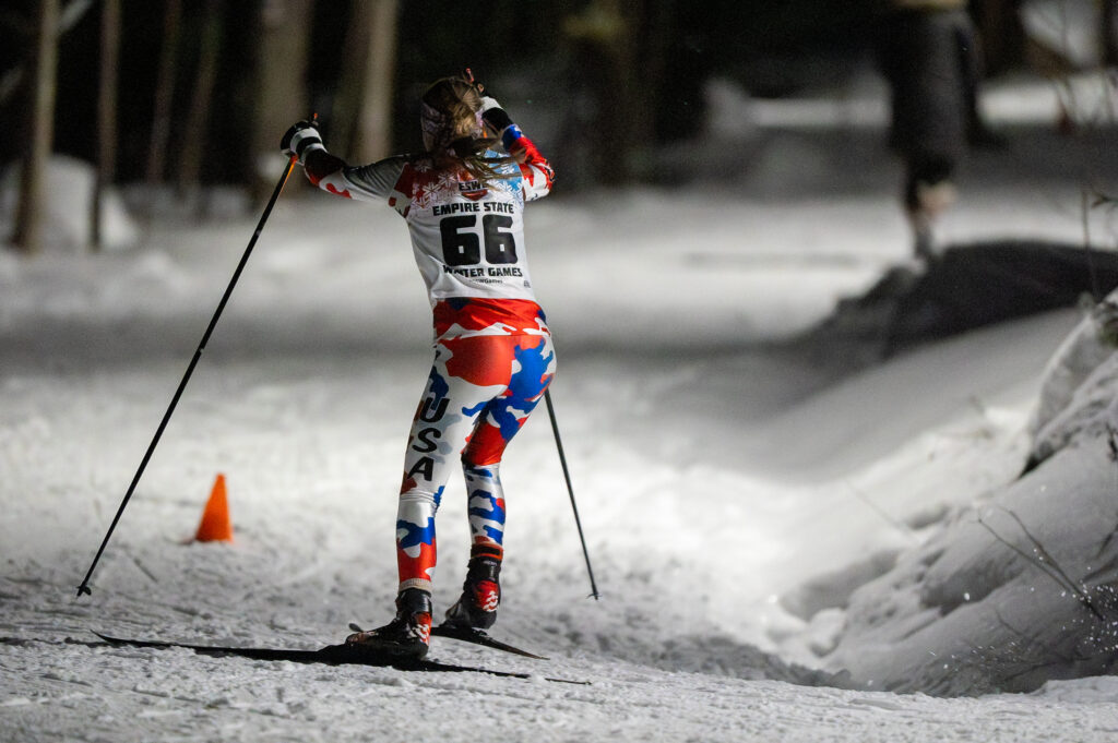 An athlete skiing in the snow
